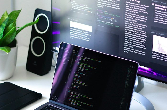 Developer workstation with code on screen for a SaaS support copilot